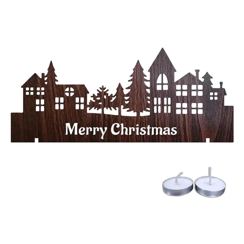 Decorative Christmas village scene with 'Merry Christmas' text and two candles on a white background
