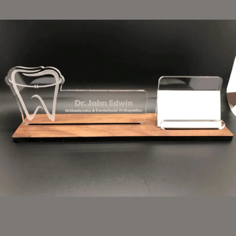 Name plate for desk India — personalised acrylic dentist desk name plate with laser-engraved tooth logo and business card holder on wooden base — ZingyGifts