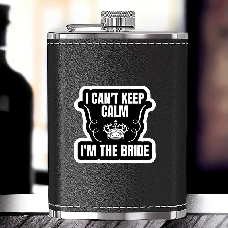 Black flask with 'I can't keep calm, I'm the bride' text on a blurred background