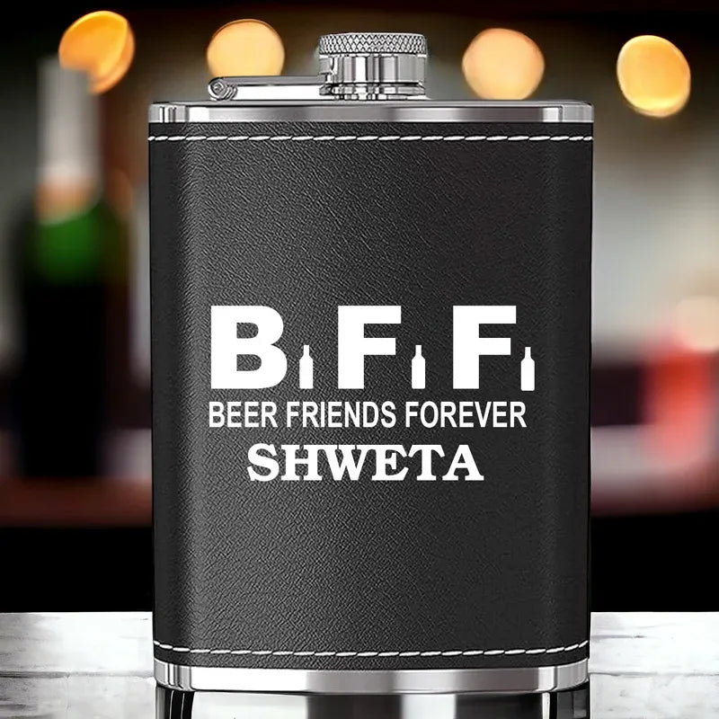 Black flask with 'BFF Beer Friends Forever SHWETA' text on a blurred bar background
