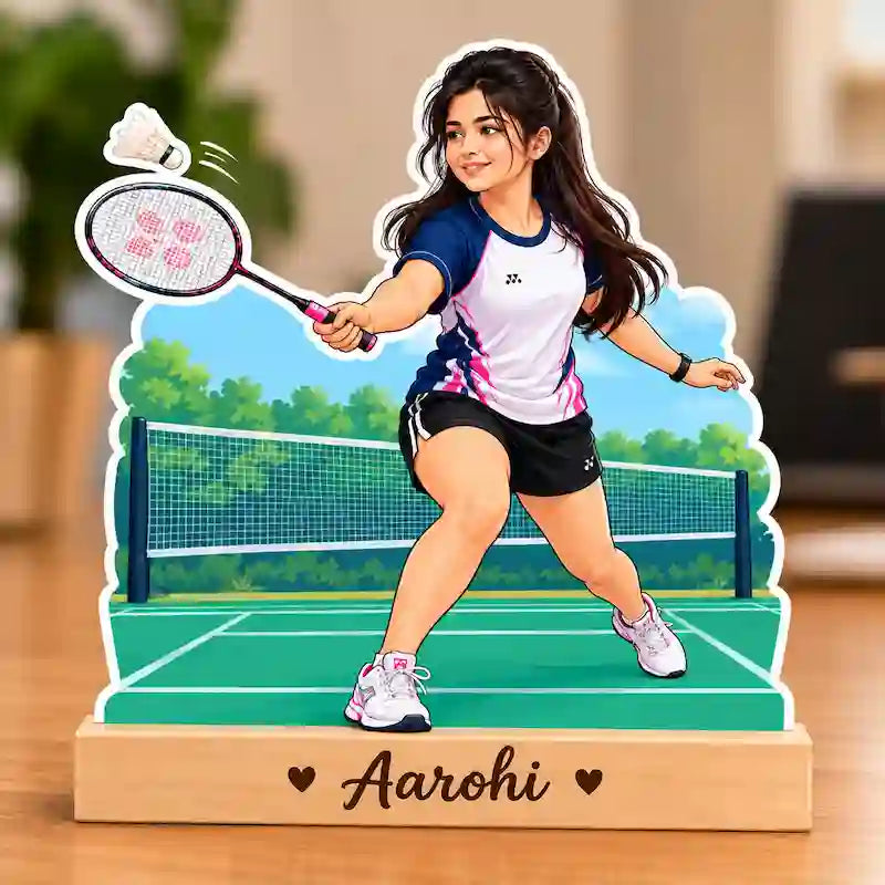 Personalized badminton caricature of a girl playing a smash on a court with a custom name on wooden base