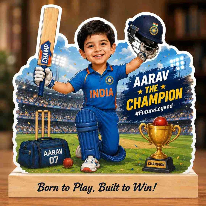 Personalized cricket-themed trophy with a child in a blue sports uniform, holding a bat and helmet, with text 'Aarav The Champion' on a wooden base.