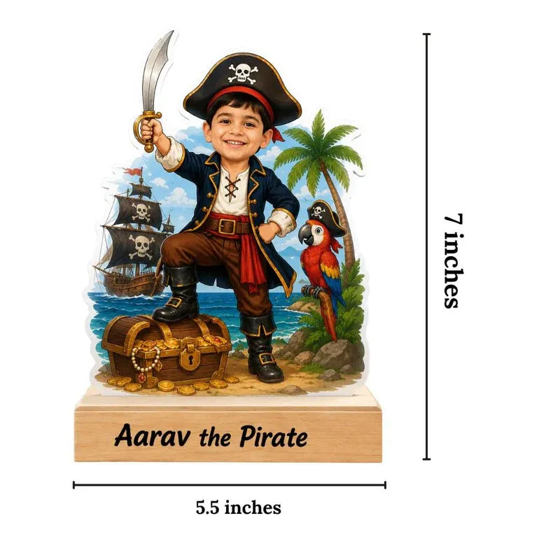 Pirate-themed figurine with a boy, parrot, and treasure chest, labeled 'Aarav the Pirate', with measurements on a white background.
