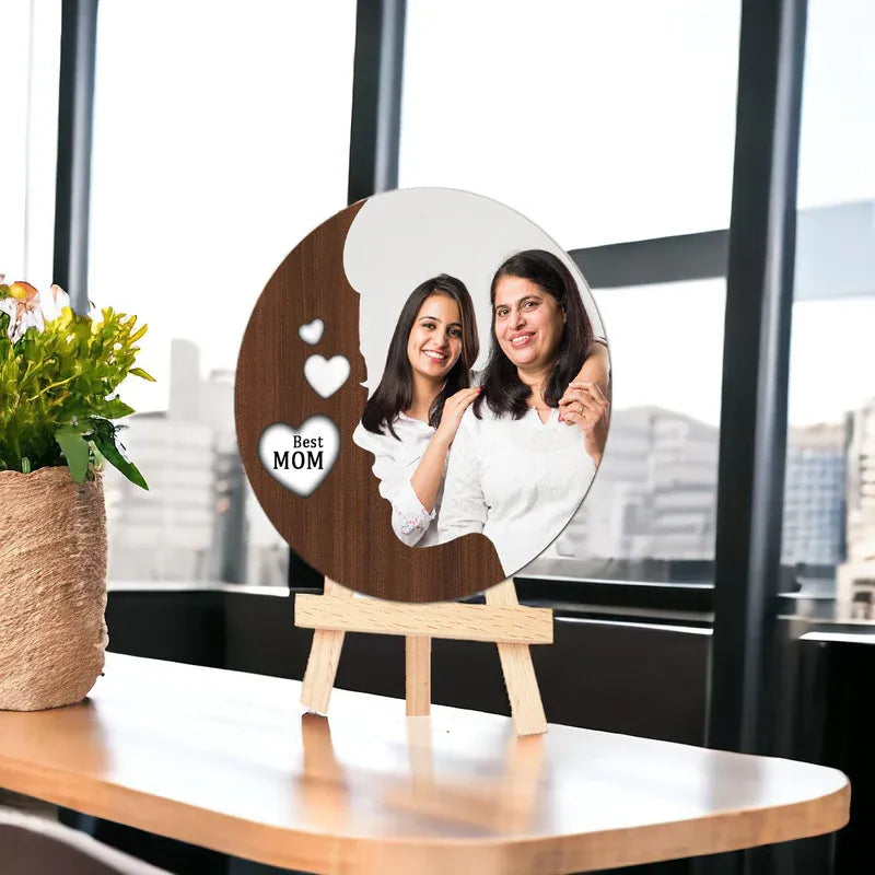 Personalized wooden photo frame with two women on a wooden stand, featuring the text 'Best Mom'.