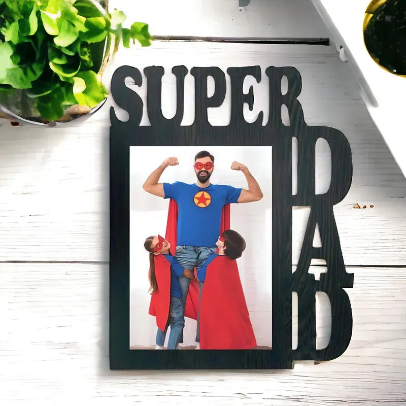 Personalized photo frame with 'Super Dad' text and a family in superhero costumes.