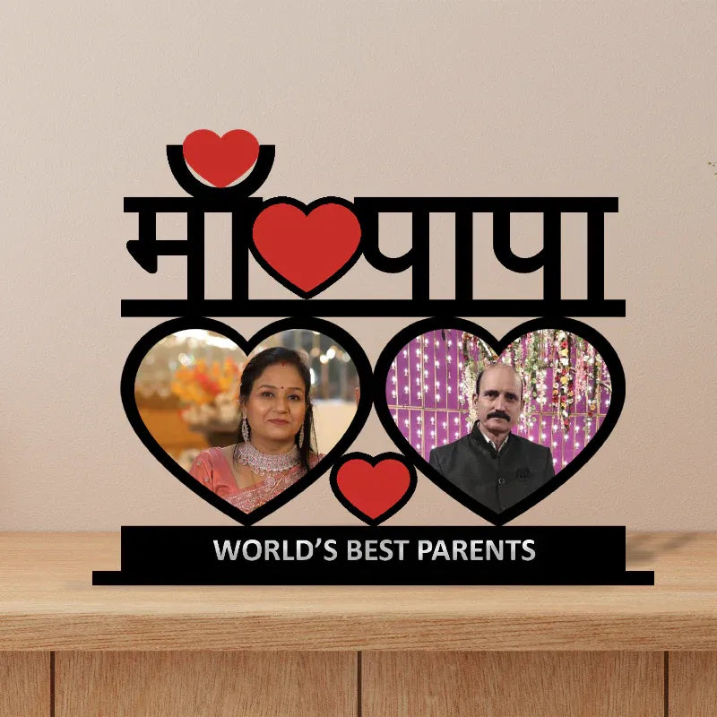 Personalized photo frame with 'World's Best Parents' text on a wooden surface.
