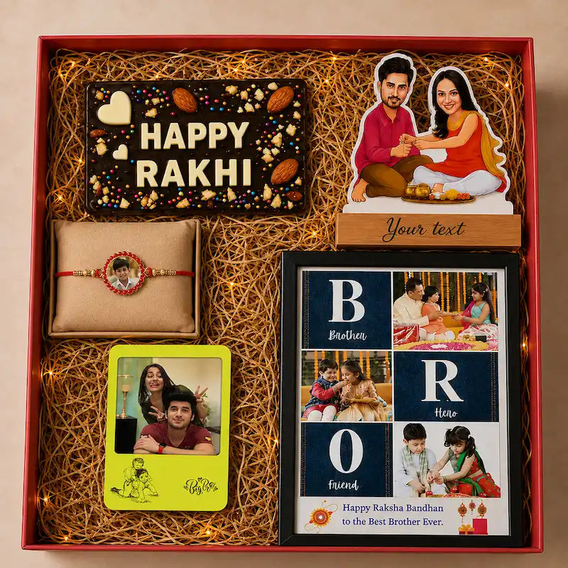 A Rakhi gift box set containing a personalized chocolate bar, a framed photo print, a decorative Rakhi on a beige card, and a wooden name cutout, all arranged in a red box with shredded tan paper and string lights.