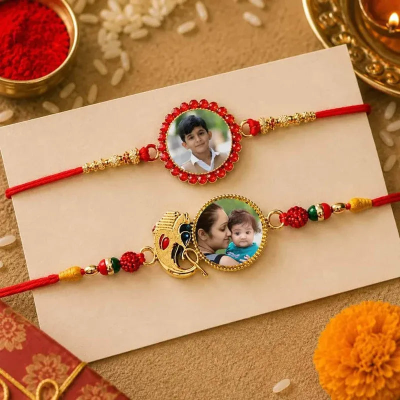 Two personalized Rakhi bracelets displayed on a beige card. The top Rakhi has a red cord, gold beads, and a red beaded circular charm with a photo of a young boy.