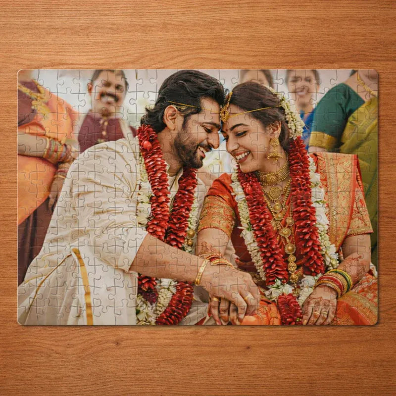 Jigsaw puzzle with a couple in traditional attire on a wooden surface